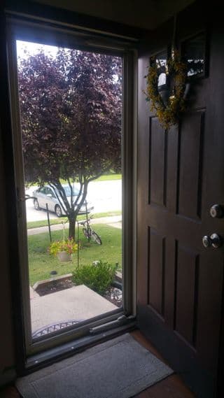 Professional door replacement and finishing details completed by Omega team