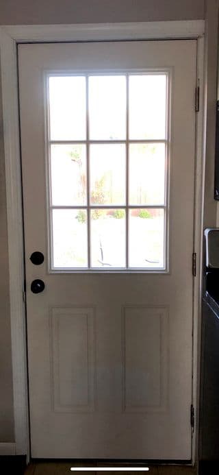 Past installation work showing completed entry renovation by Omega Doors and Locks